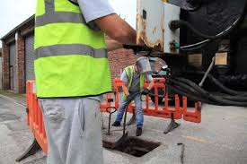 Working for blocked drain Cheltenham